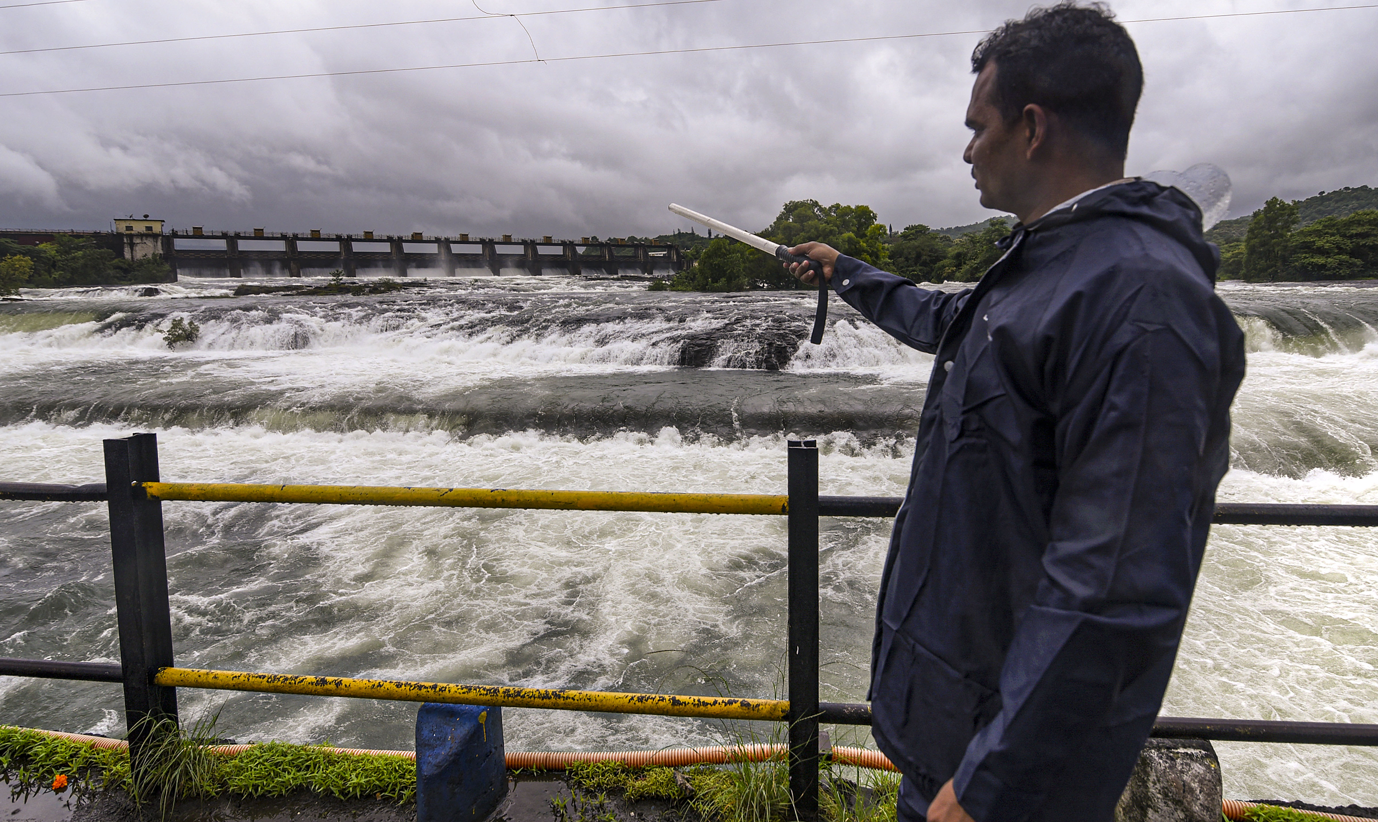 PTI : The water level of the Khadakwasla dam overflows during heavy monsoon, in Pune district, Wednesday, July 24, 2024